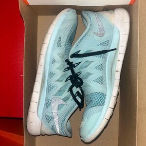 Blue and white Nike sneakers
